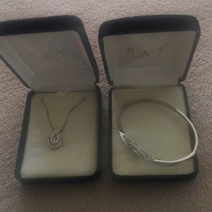 “loves embrace” necklace and bracelet